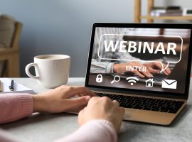 Webinar.,Woman,Using,Laptop,At,Table,,Closeup